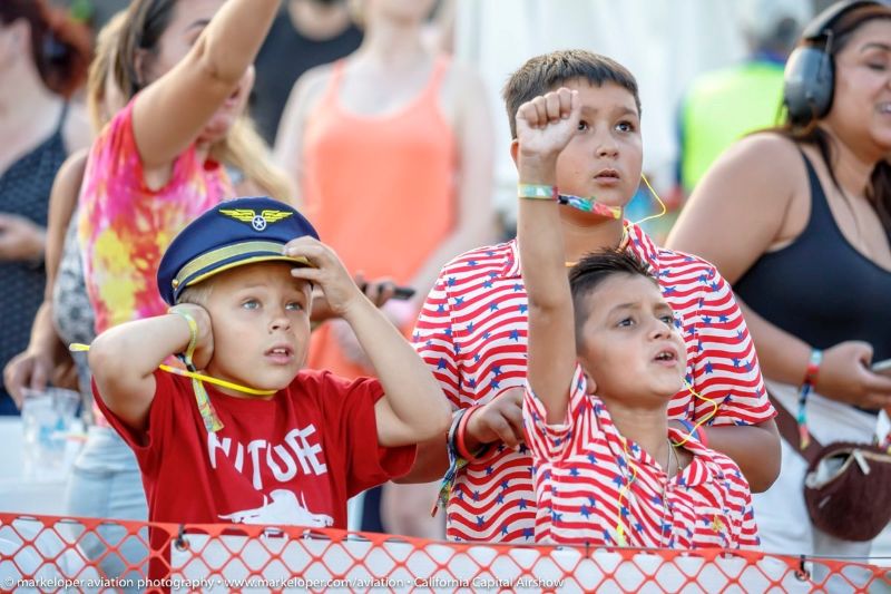 Happy Guys in the Crowd